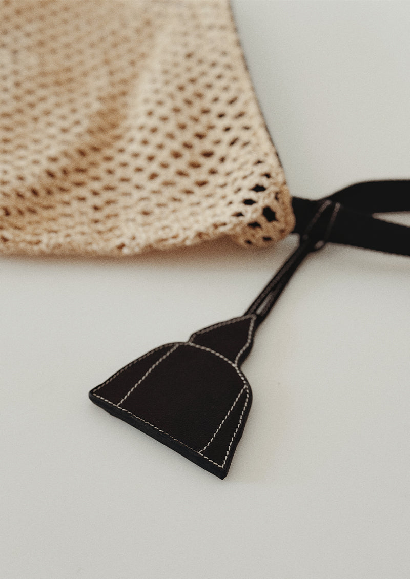 pendentif sac haj sage en cuir noir