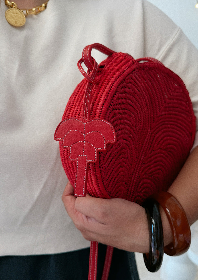 PENDENTIF SAC PALMIER SIGNATURE EN CUIR ROUGE