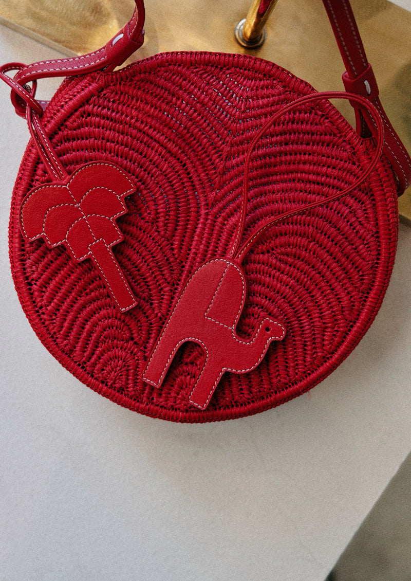PENDENTIF SAC PALMIER SIGNATURE EN CUIR ROUGE