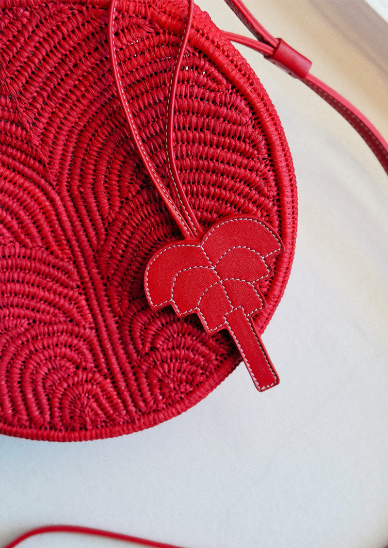 PENDENTIF SAC PALMIER SIGNATURE EN CUIR ROUGE